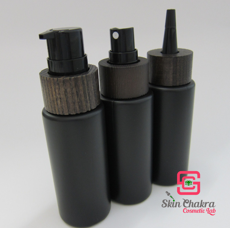 cosmetic bottles with wood optic